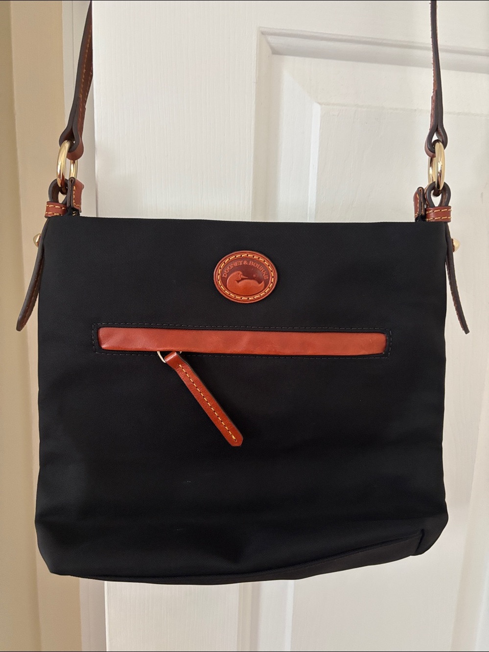 Dooney & Bourke Black Crossbody with Brown Trim and Gold Hardware